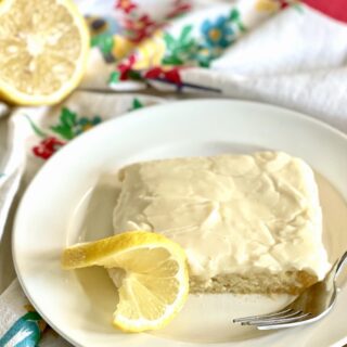 Plate with a piece of lemon cake.