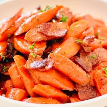 Simple glazed carrots recipe made with Dijon mustard, honey, and bacon, ready to serve for dinner or entertaining.