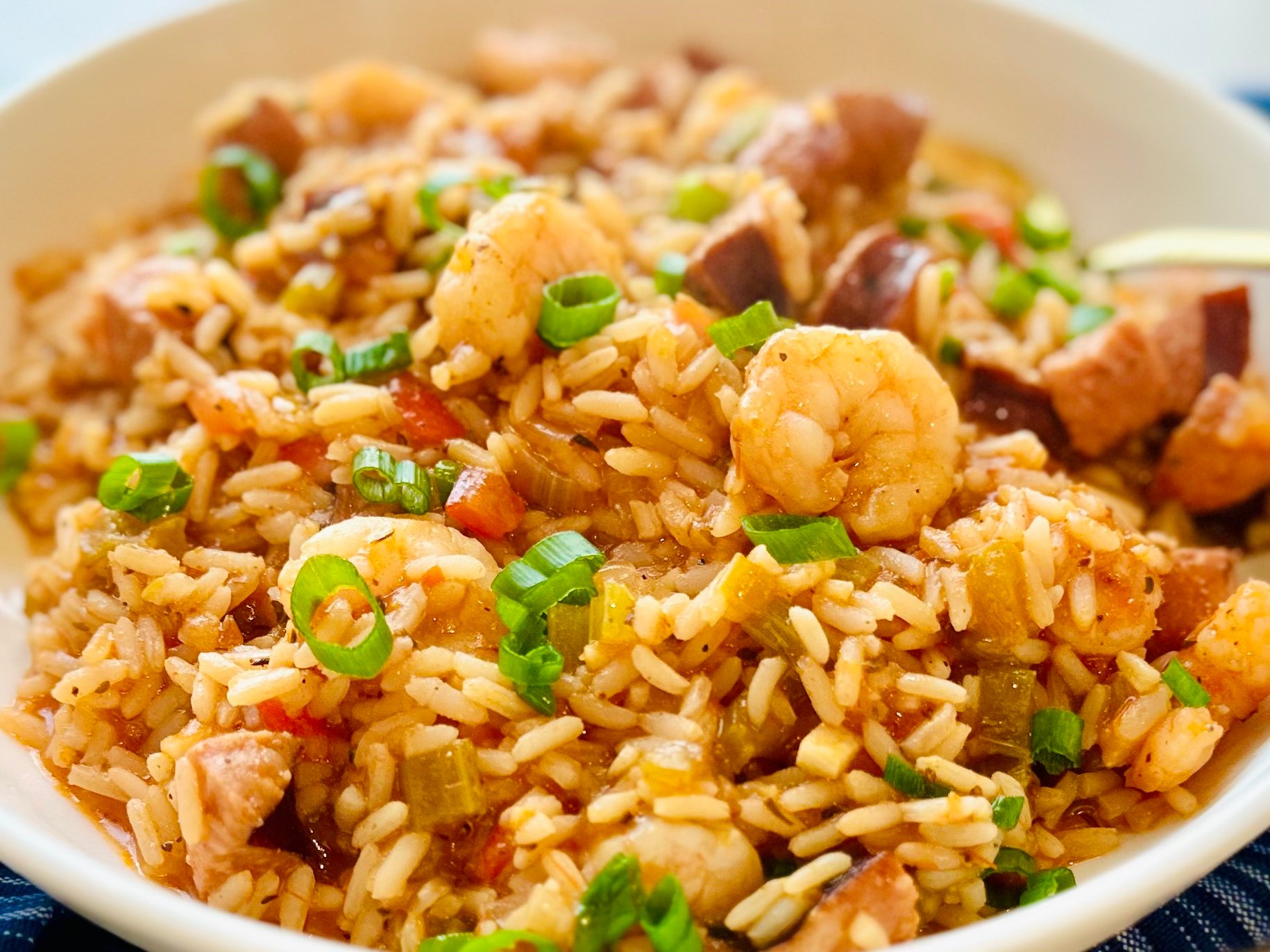 Close-up of spicy sausage and shrimp jambalaya with fluffy rice
