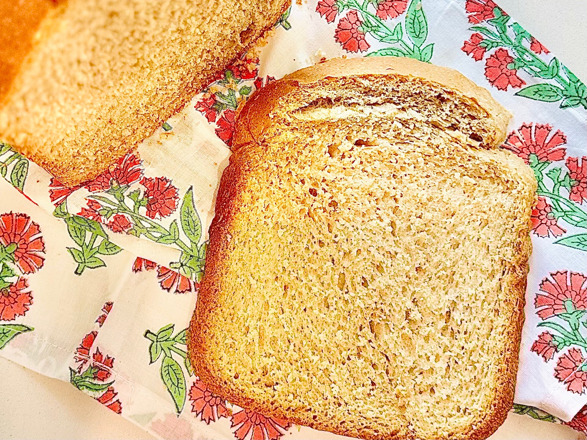 Sliced homemade beer bread showing a chewy texture and even crumb