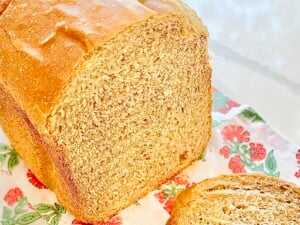 Rustic beer bread loaf with a dark, toasty crust and tender center, perfect for serving with soup or butter