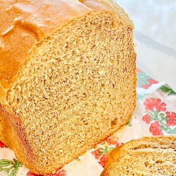 Rustic beer bread loaf with a dark, toasty crust and tender center, perfect for serving with soup or butter