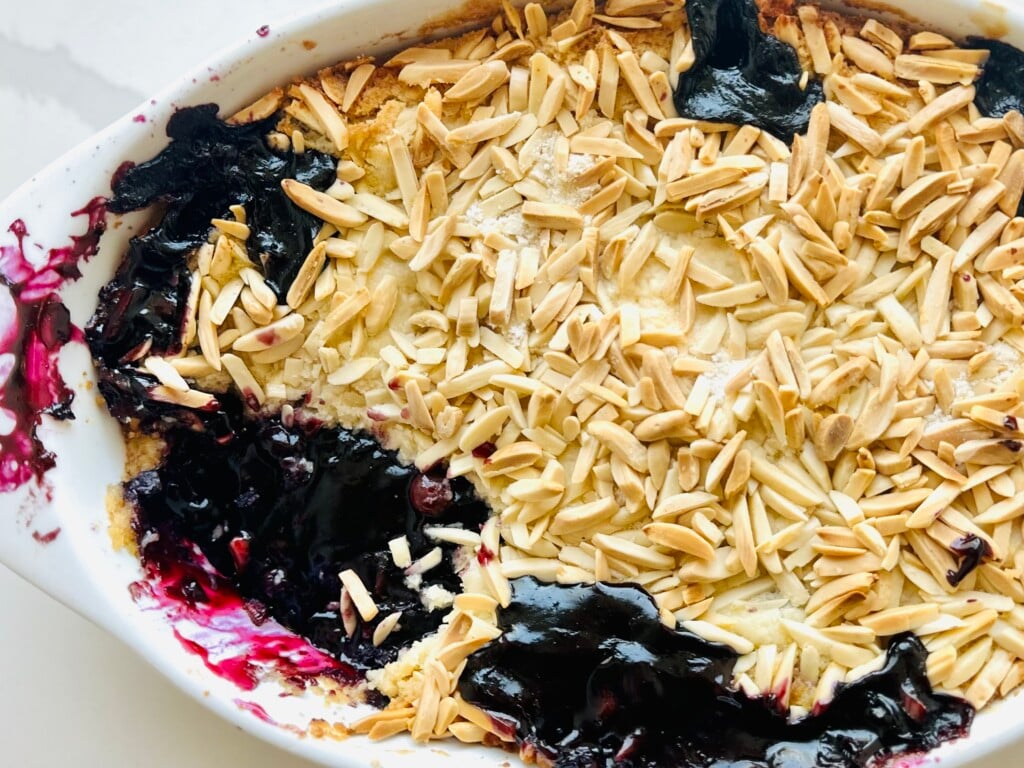 Deep blueberry filling topped with buttery cake and toasted almonds.