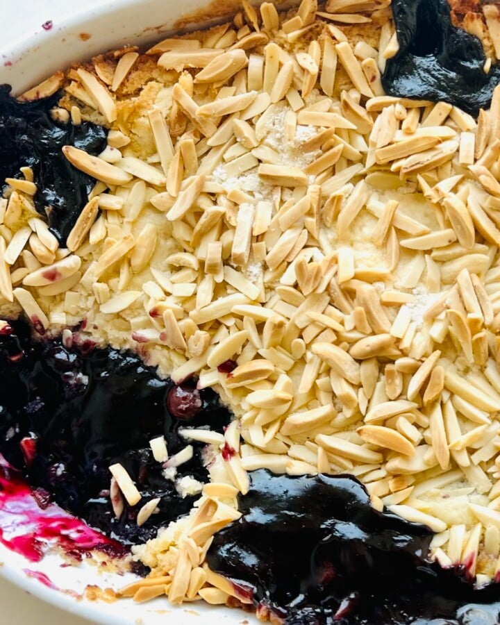Deep blueberry filling topped with buttery cake and toasted almonds.