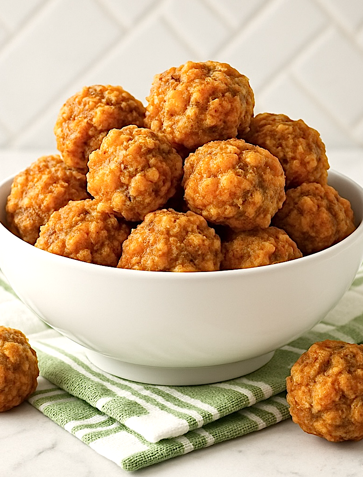bisquick sausage balls in a white bowl