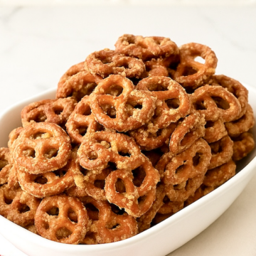 A white bowl full of Butter Toffee Pretzels
