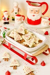 Peppermint Chocolate Christmas Trees piled into a sleigh serving tray