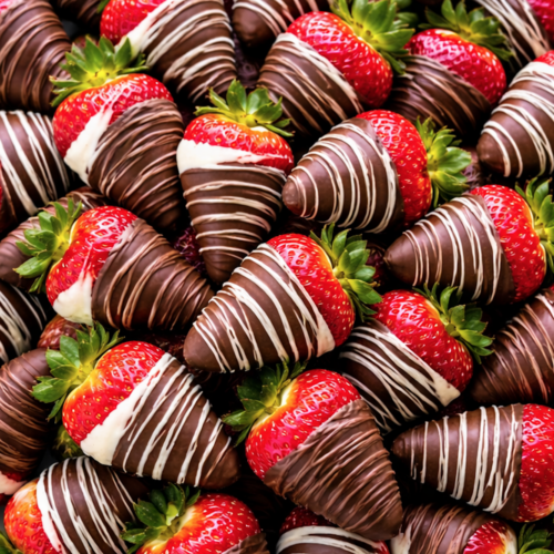 Chocolate covered strawberries with dark chocolate and white chocolate drizzle arranged closely on a plate