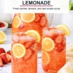 Homemade strawberry lemonade with fresh strawberries, lemon slices, and ice.