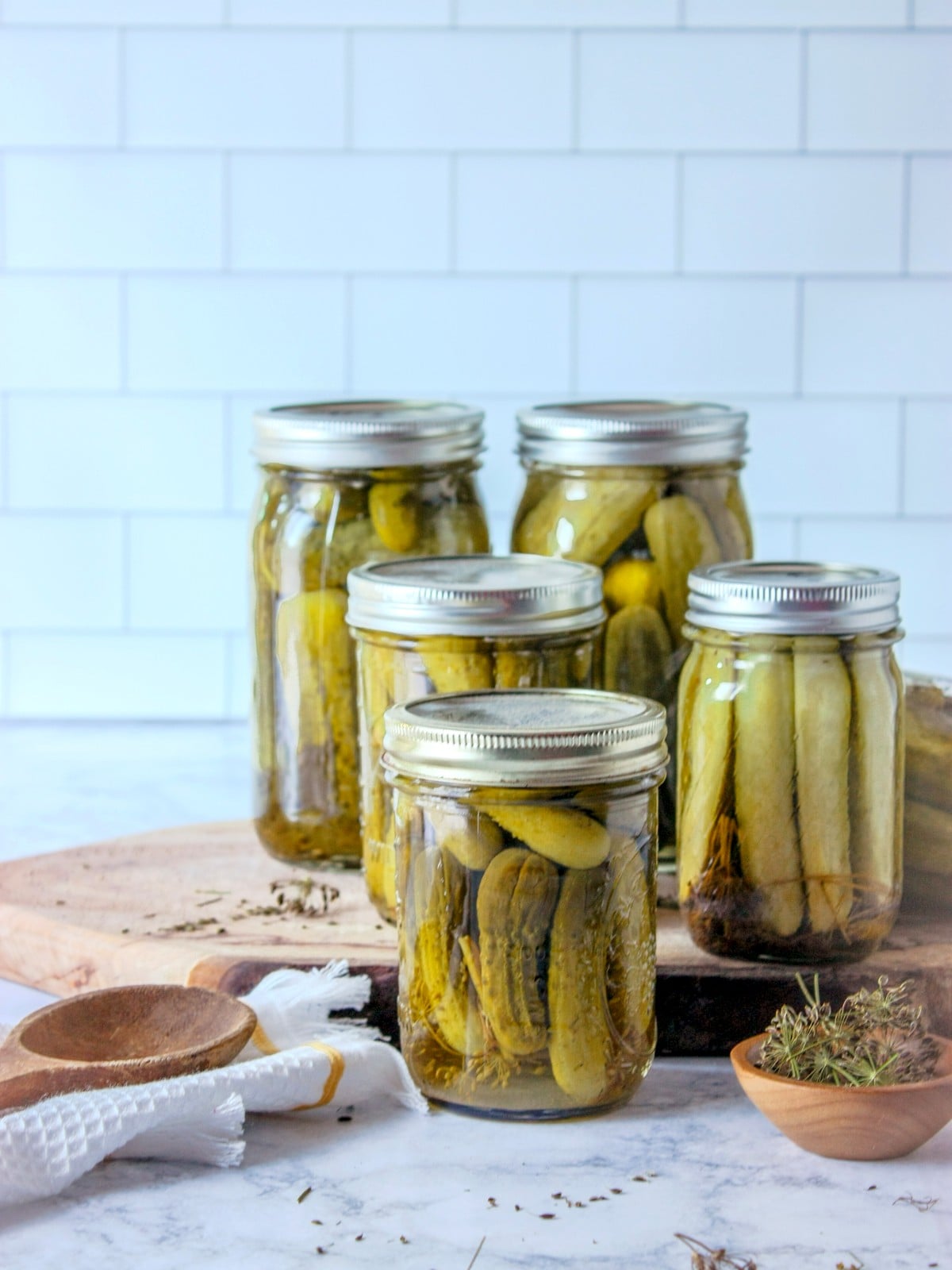 Finished jars of homemade old-fashioned garlic dill pickles