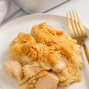 Creamy chicken and rice casserole served with a crisp buttery Ritz cracker topping.