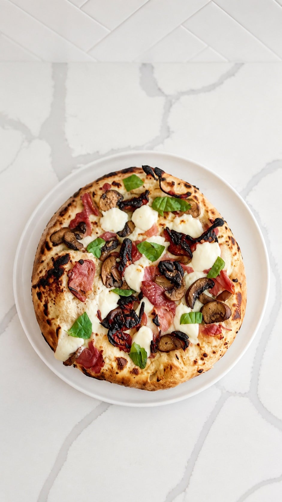 Overhead wood-fired pizza made with 00 flour and overnight poolish dough.