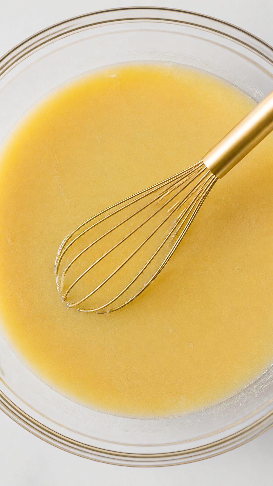 Sugar vegetable oil and eggs whisked together in one mixing bowl
