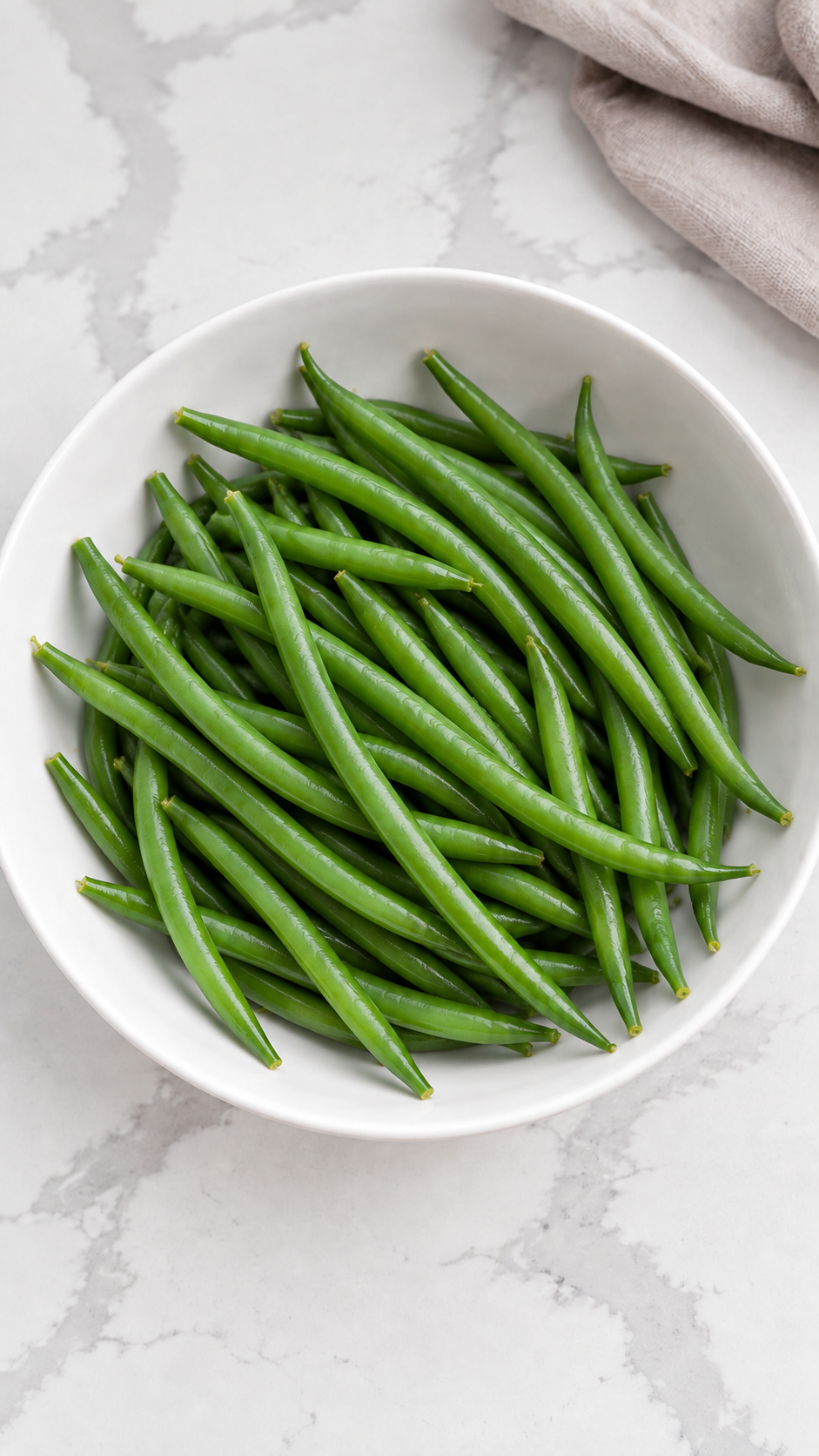 Whole green beans steamed until just tender and cooling before wrapping.