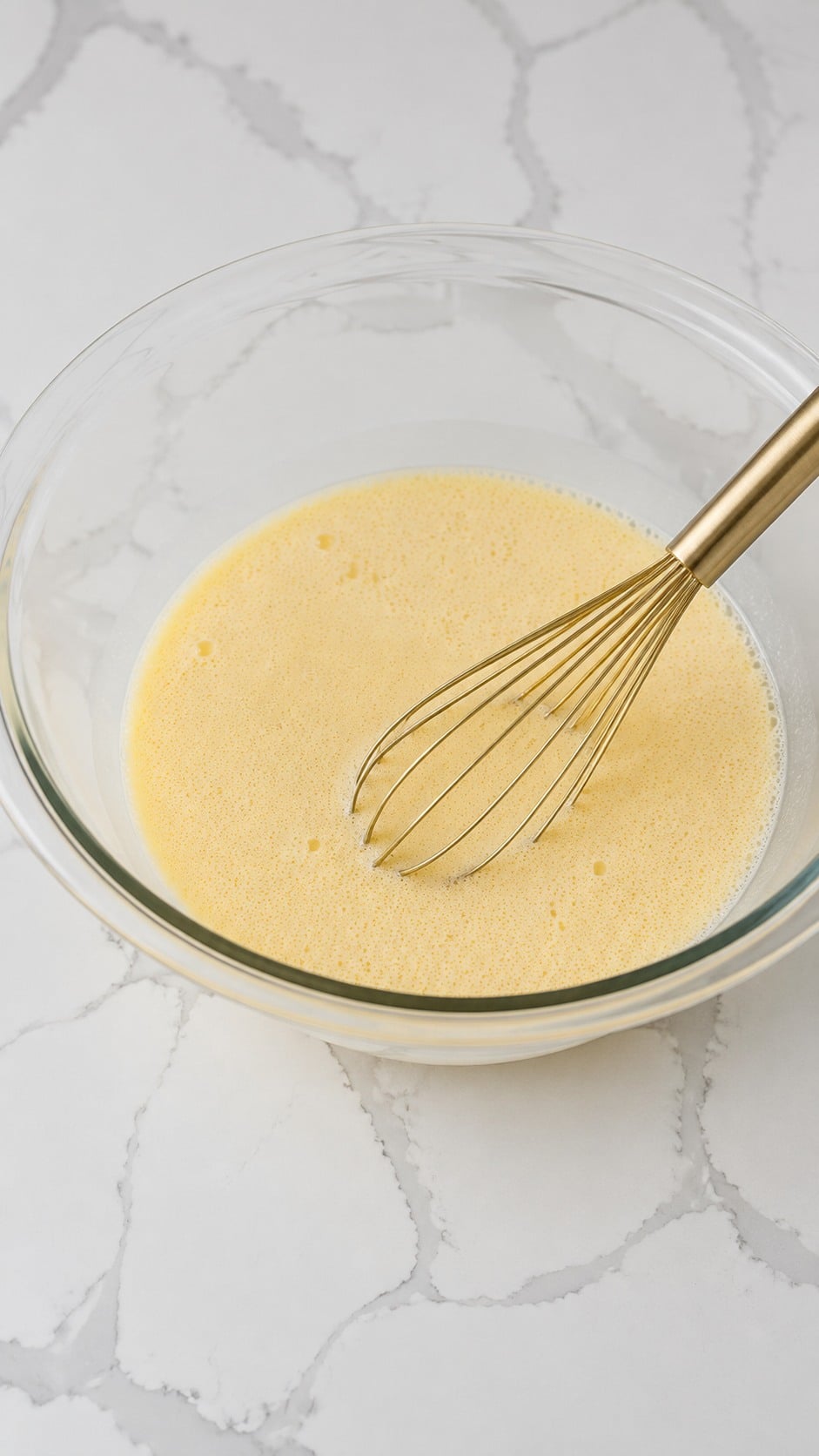 Melted butter, sugar, milk, eggs, salt, and activated yeast whisked together for roll dough.