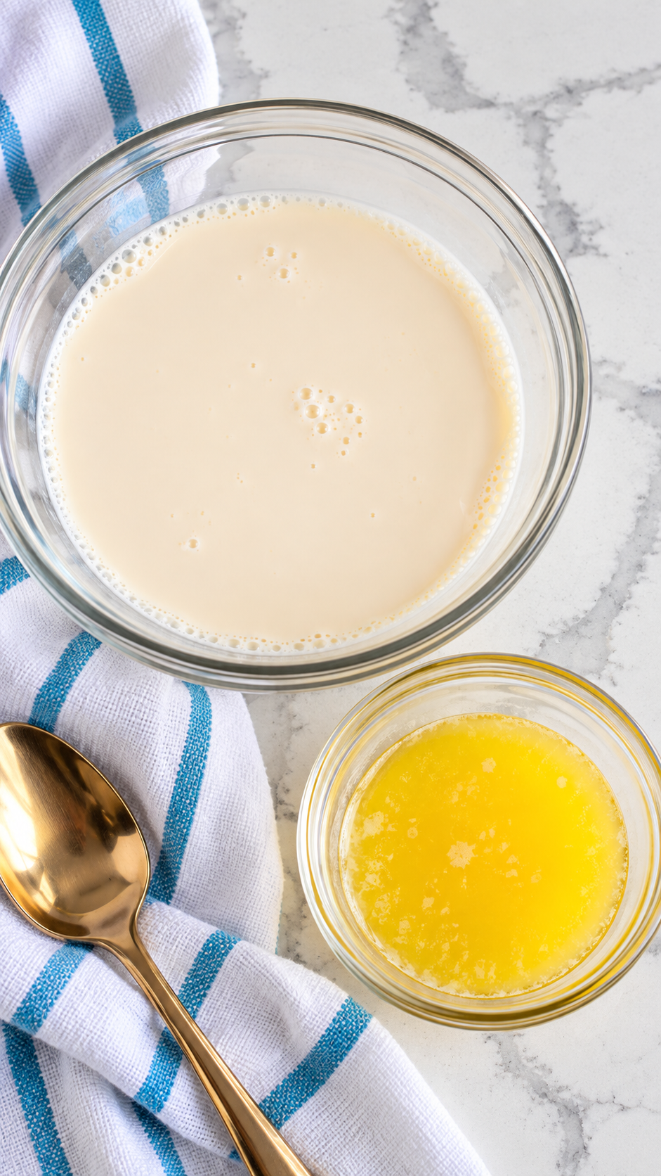 Warm evaporated milk and melted butter in separate glass bowls