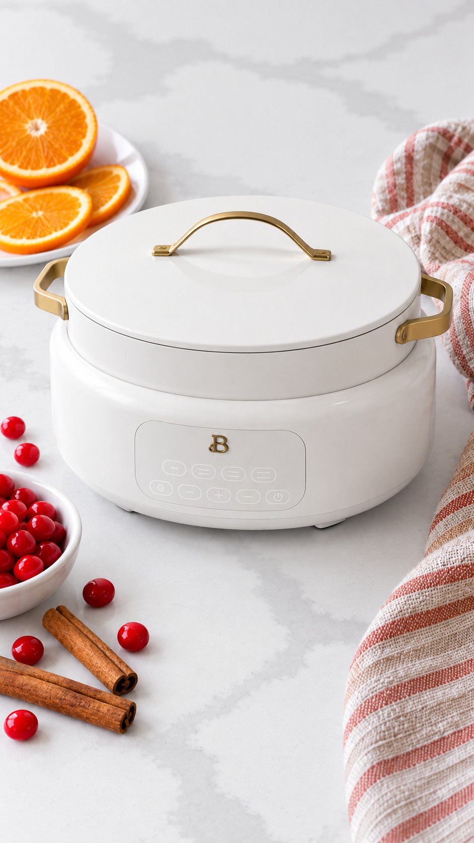 White Beautiful multi-cooker covered while the cider heats.
