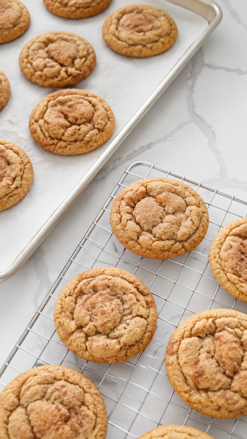 Freshly baked pumpkin spice cookies cooling on a wire rack.