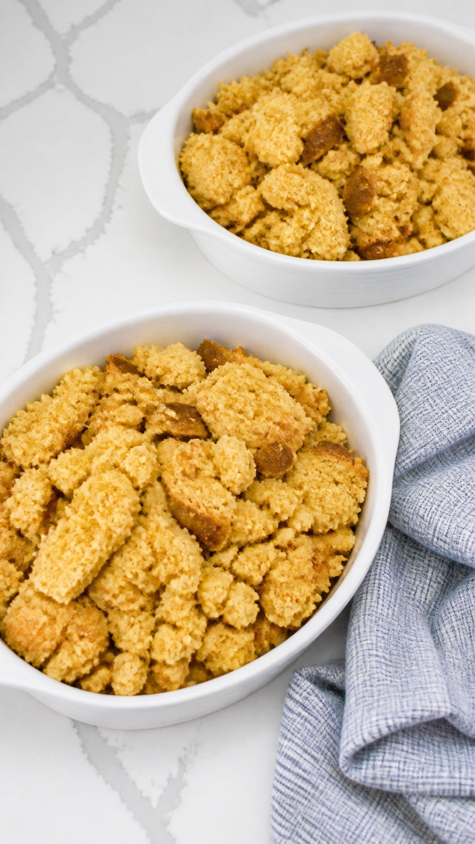 Crumbled non-sweet cornbread drying in two shallow dishes