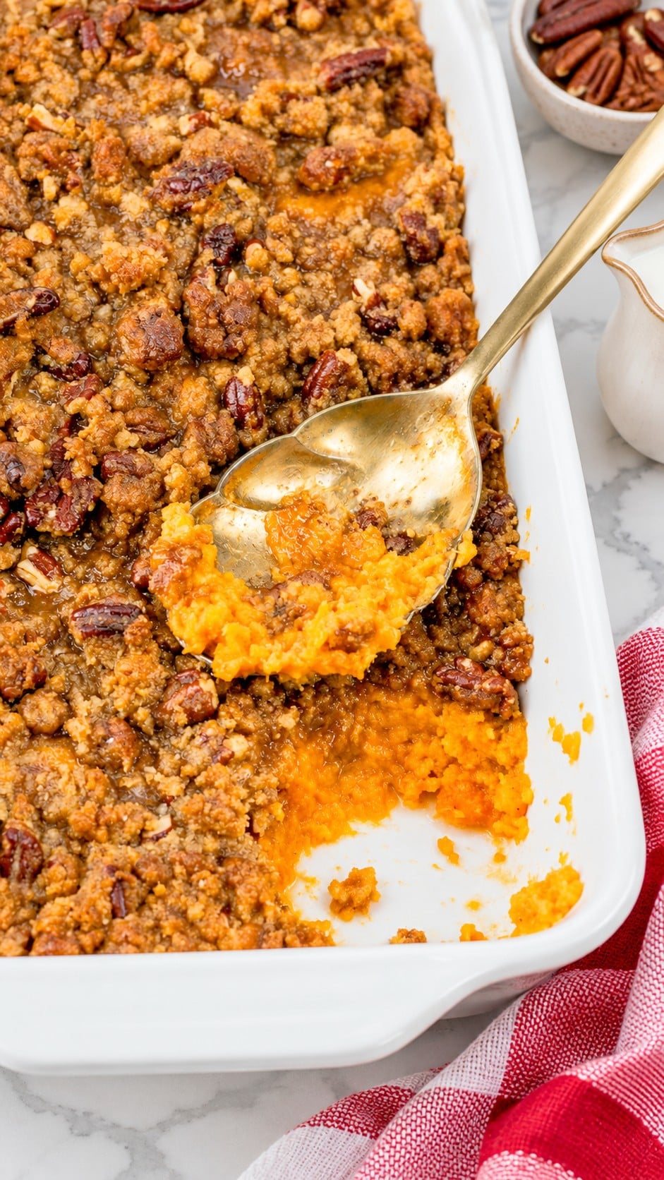 Pecan praline topping over creamy sweet potato casserole