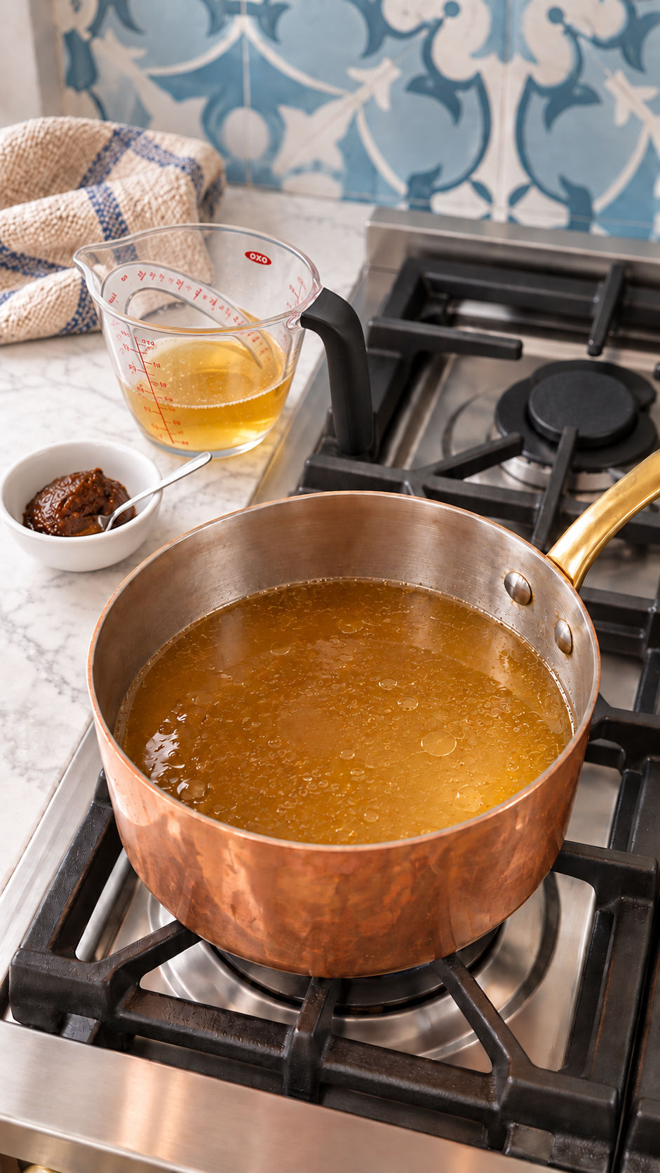 Strained giblet broth combined with turkey drippings before thickening