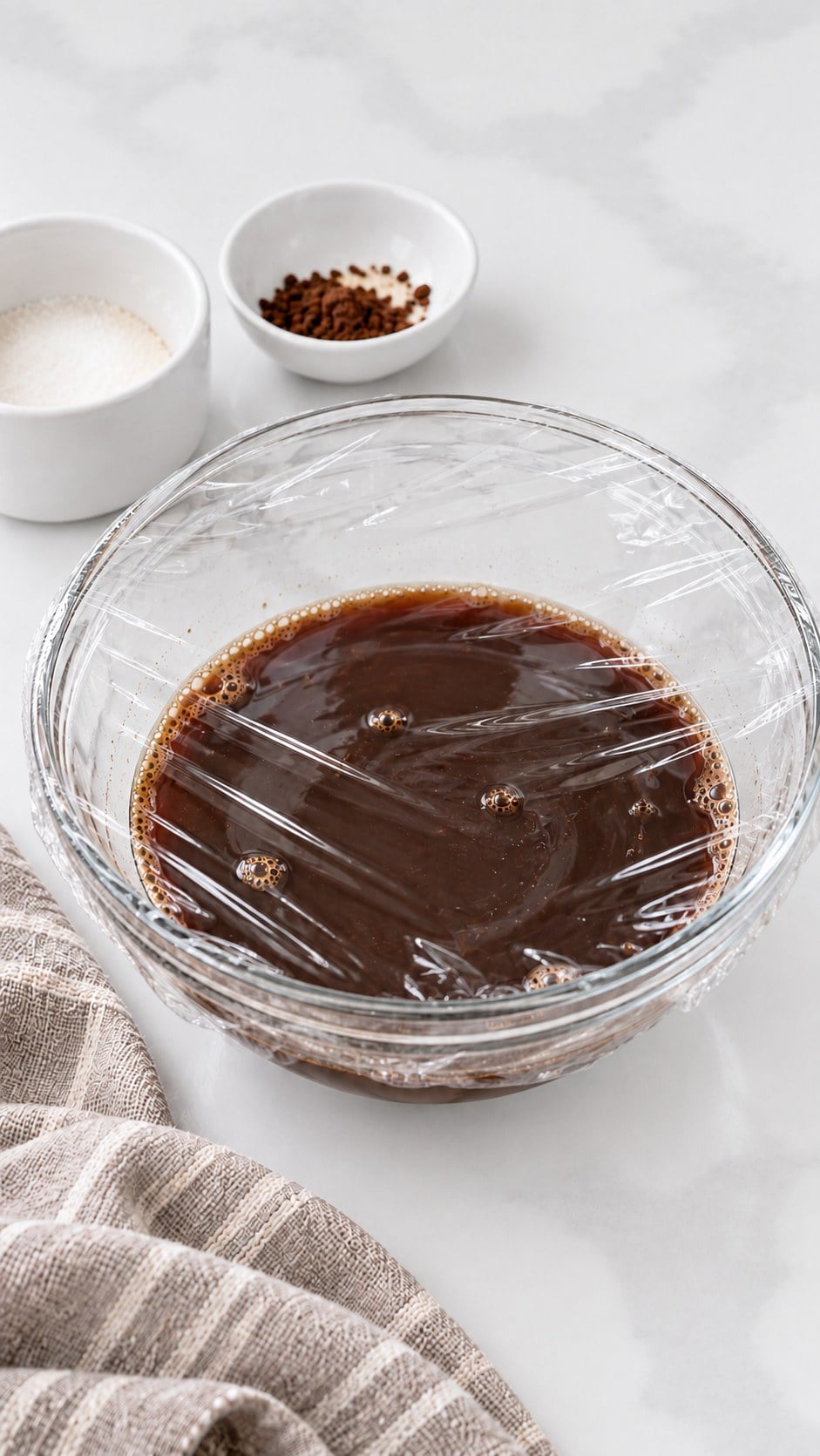 Covered dark coffee concentrate ready to chill
