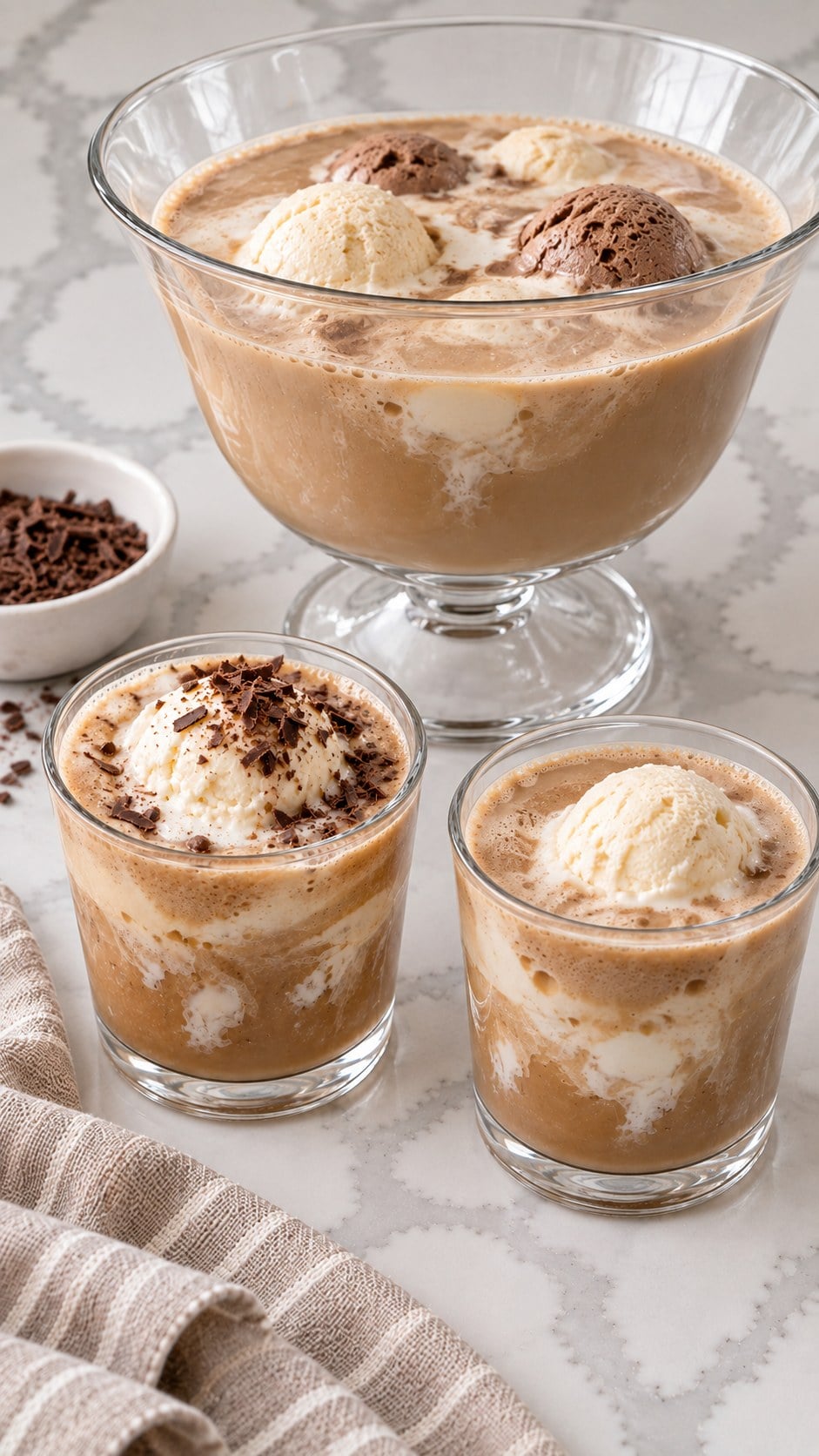 Coffee punch served from a glass punch bowl into cups