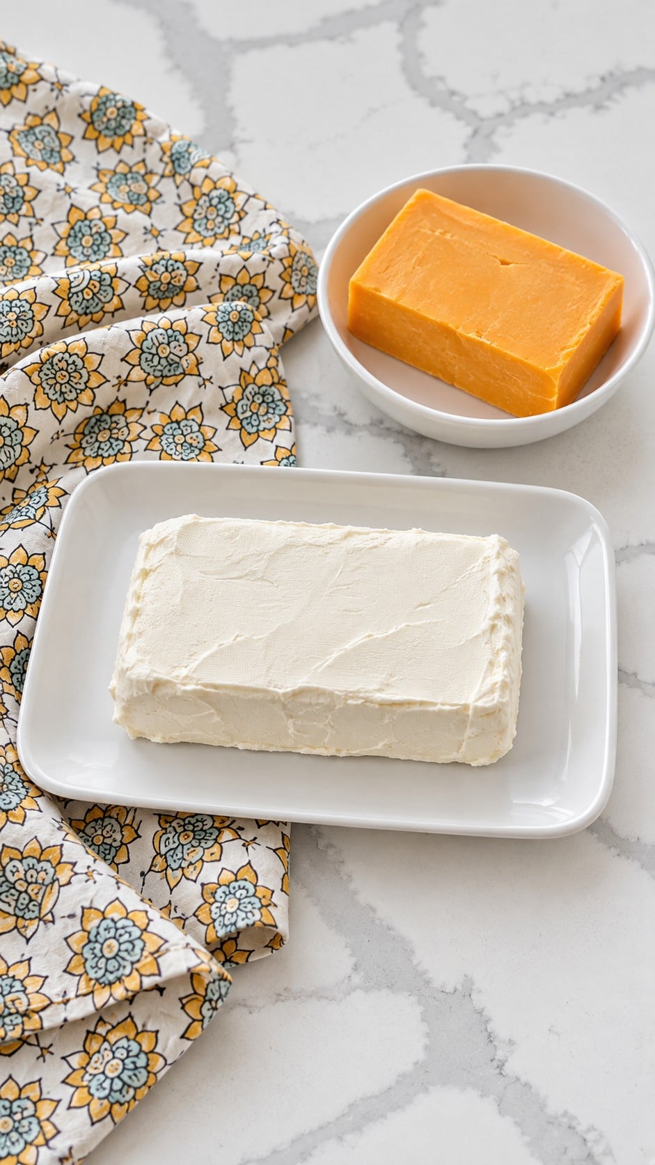 Cold block cream cheese firmed briefly for slicing.