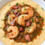 Cooked shrimp and andouille warmed in amber cream gravy