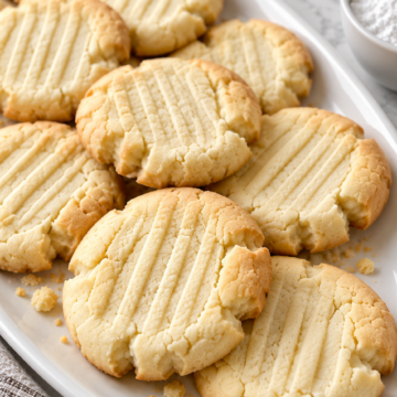 Close view of the delicate crumb and fork stripes on butter meltaway cookies